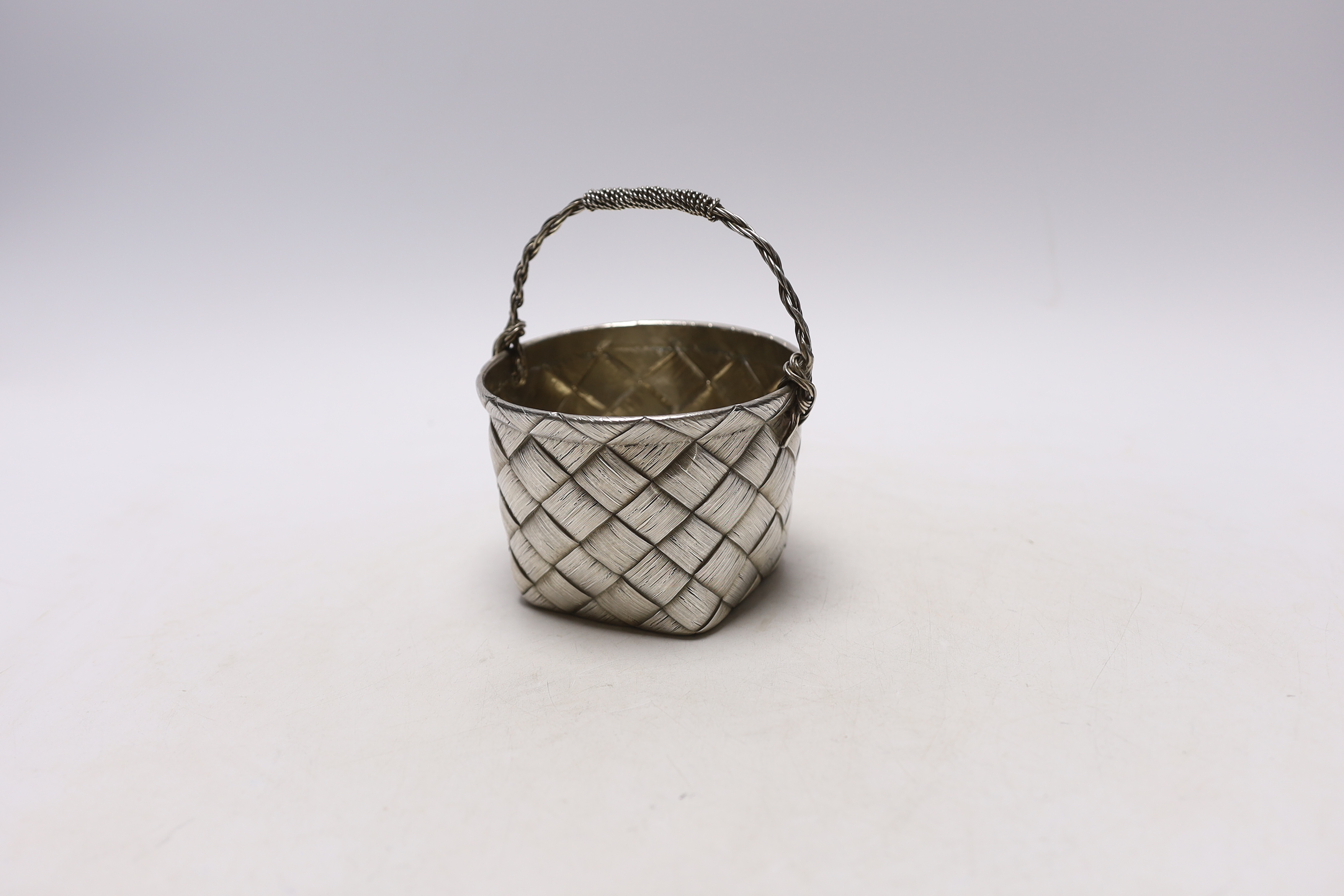 A late 19th century Russian 84 zolotnik ‘basket’ bowl, master Gavril Gratchev (with later handle?), width 10.3cm, gross weight 10oz.